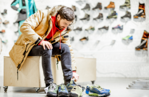 A shopper finding the right shoe size