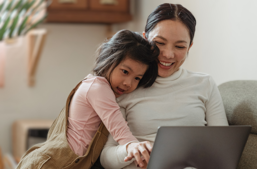 A parent sharing the kids' product experience with their child through product testing
