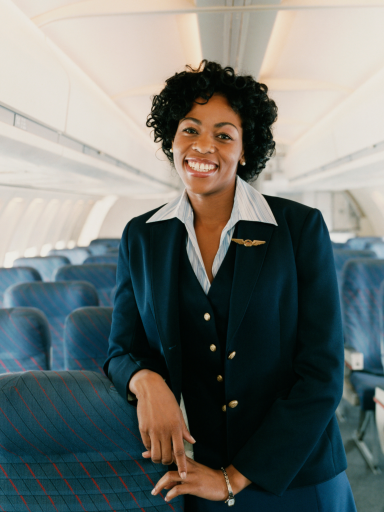 Flight attendant smiling