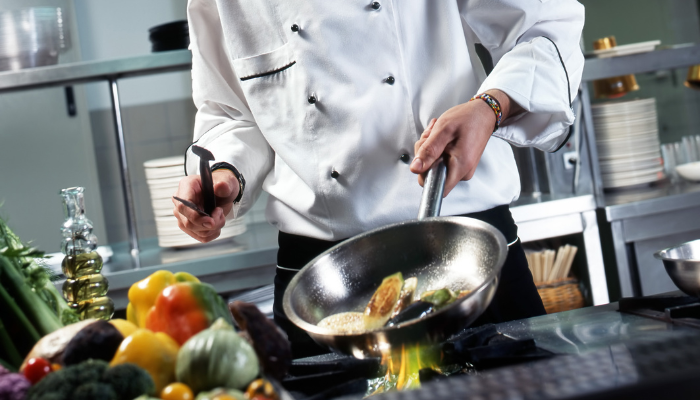 Chef testing workwear products in the kitchen.